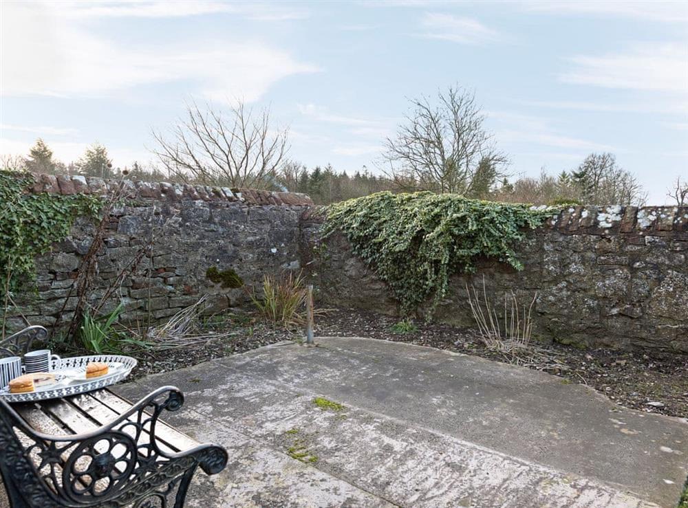 Peaceful, enclosed lawned garden at Crescent Cottage in Lowther, near Penrith, Cumbria
