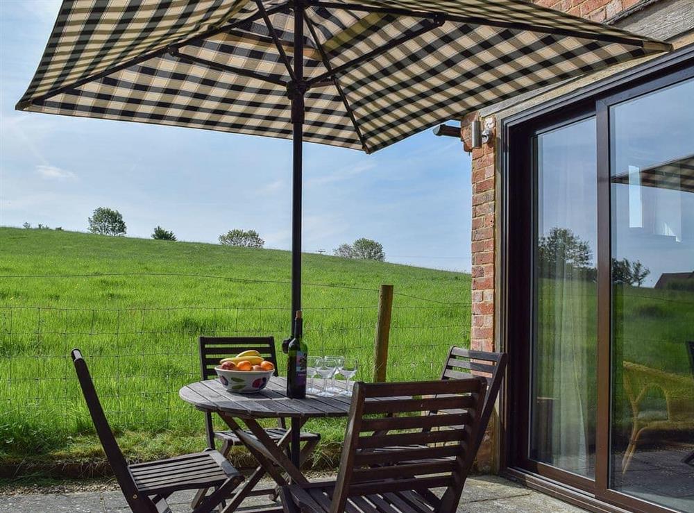 Sunny patio with lovely countryside views at Cressida in Lower Fulbrook, Warwick, Warks., Warwickshire