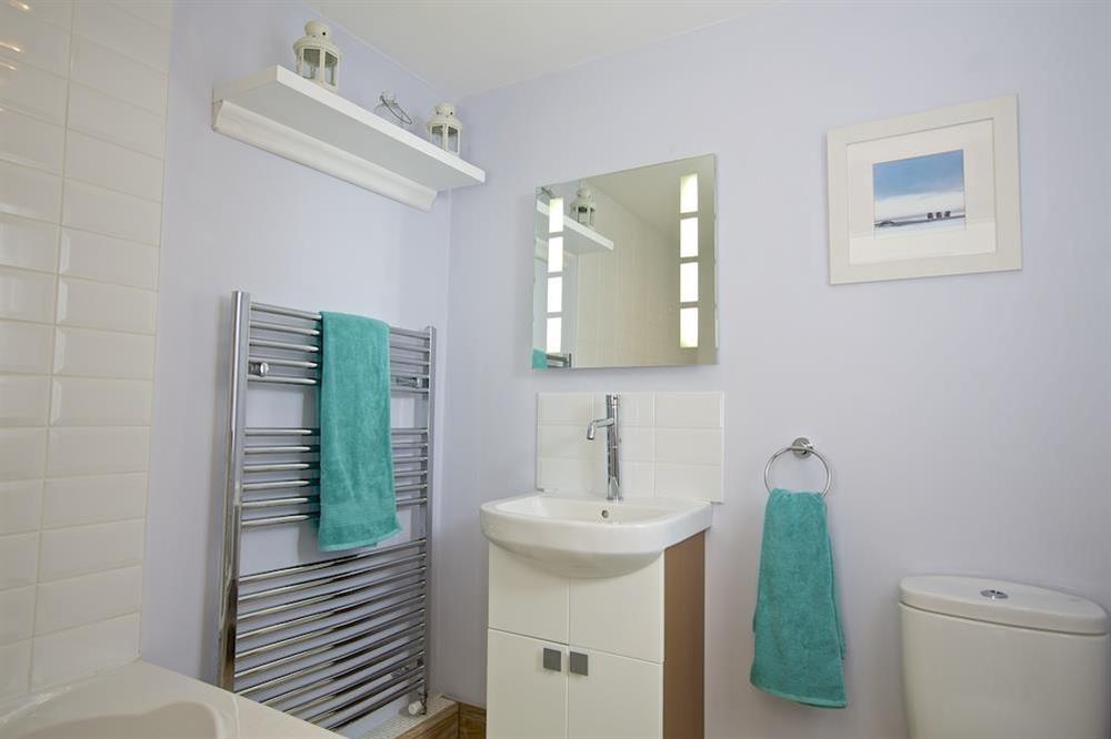 Bright bathroom with bath and shower (over) at Crew House in Dart Marina, Dartmouth