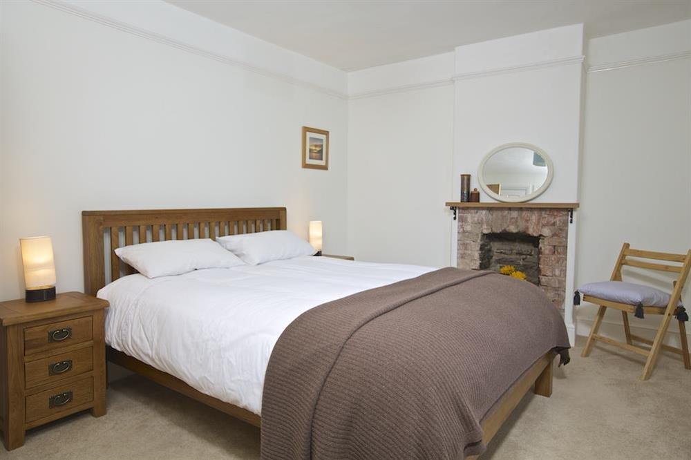 Master bedroom with King-size bed at Crew House in Dart Marina, Dartmouth