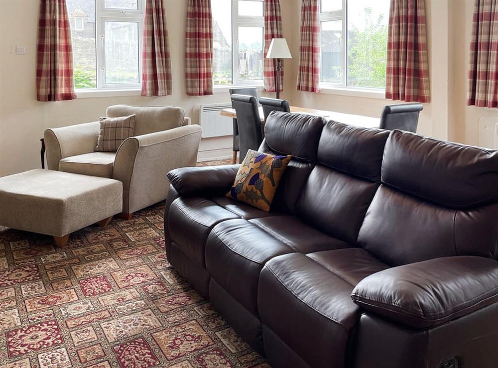 Open plan living space at Crianlarich Cottage in Fort Augustus, Inverness-Shire