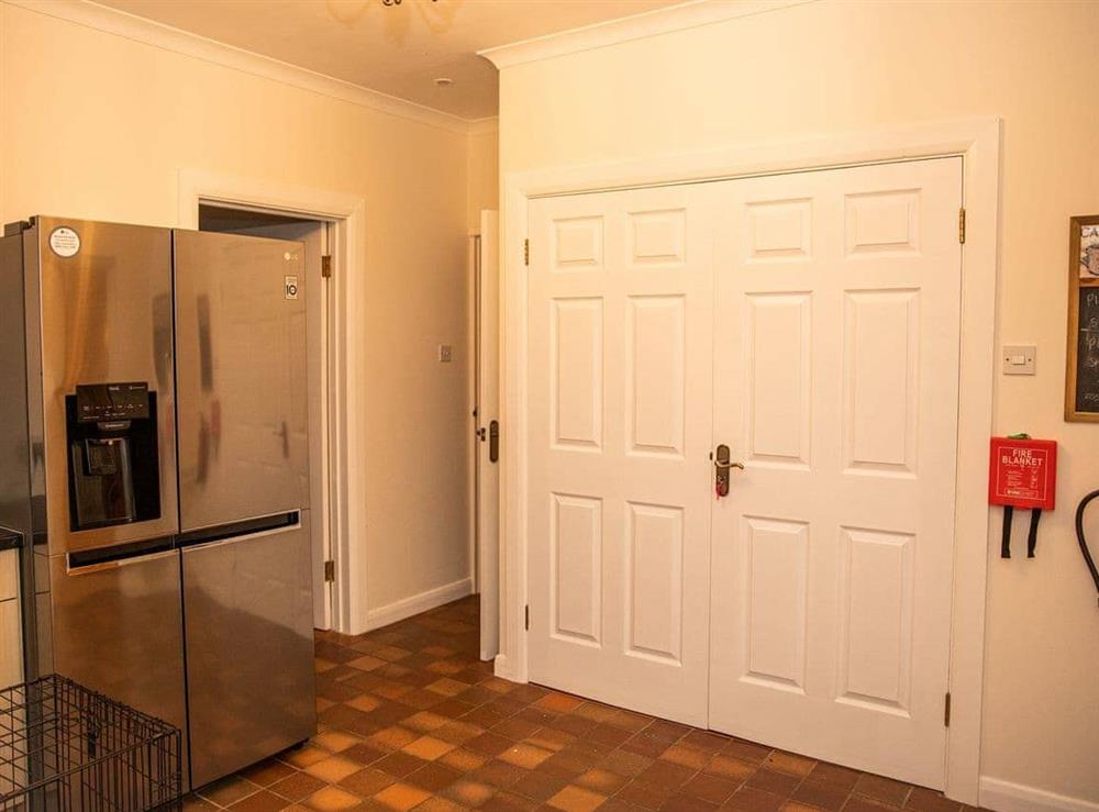 Rear entrance room, leading to Kitchen, utility room and annexe. Large American style fridge-freezer, including Ice machine. 2 Dog crate available. at Crickledown in High Ham, Langport, Somerset