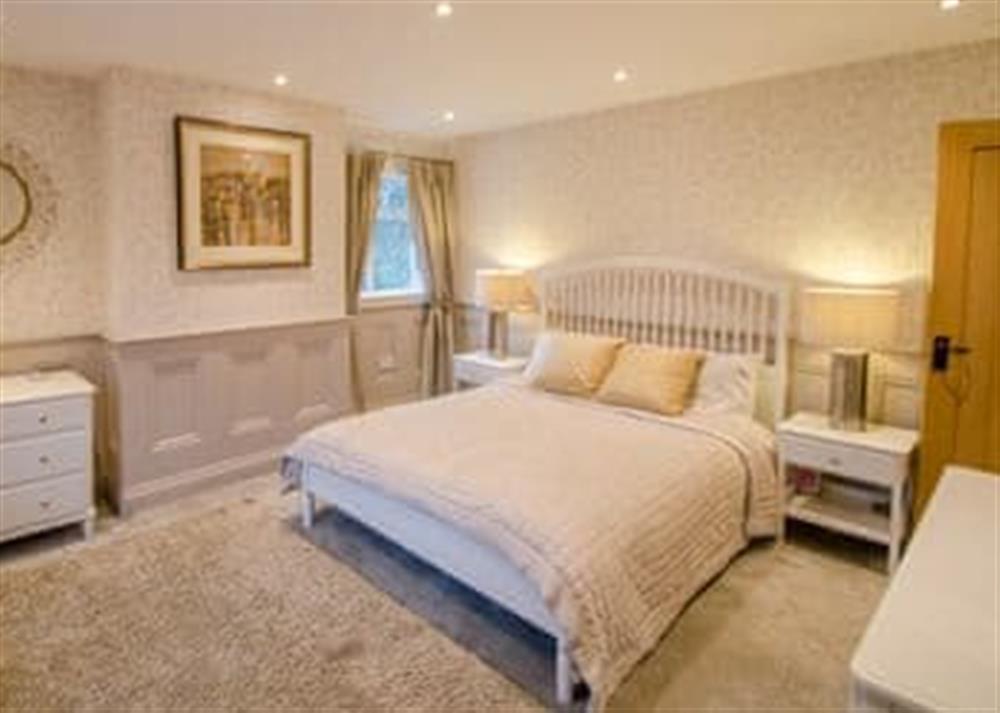 Double bedroom at Crime Cottage in Daisy Nook, near Manchester, Lancashire
