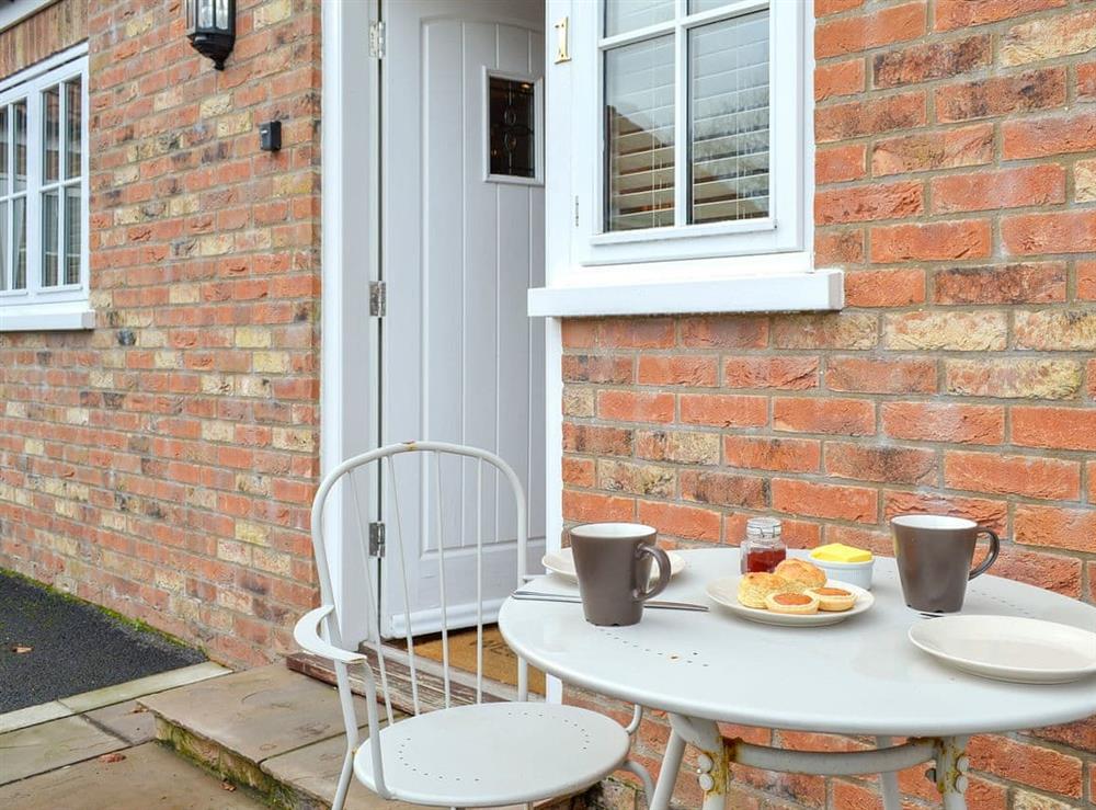 Sitting-out area with garden furniture (photo 2) at 1 Croft Cottage, 