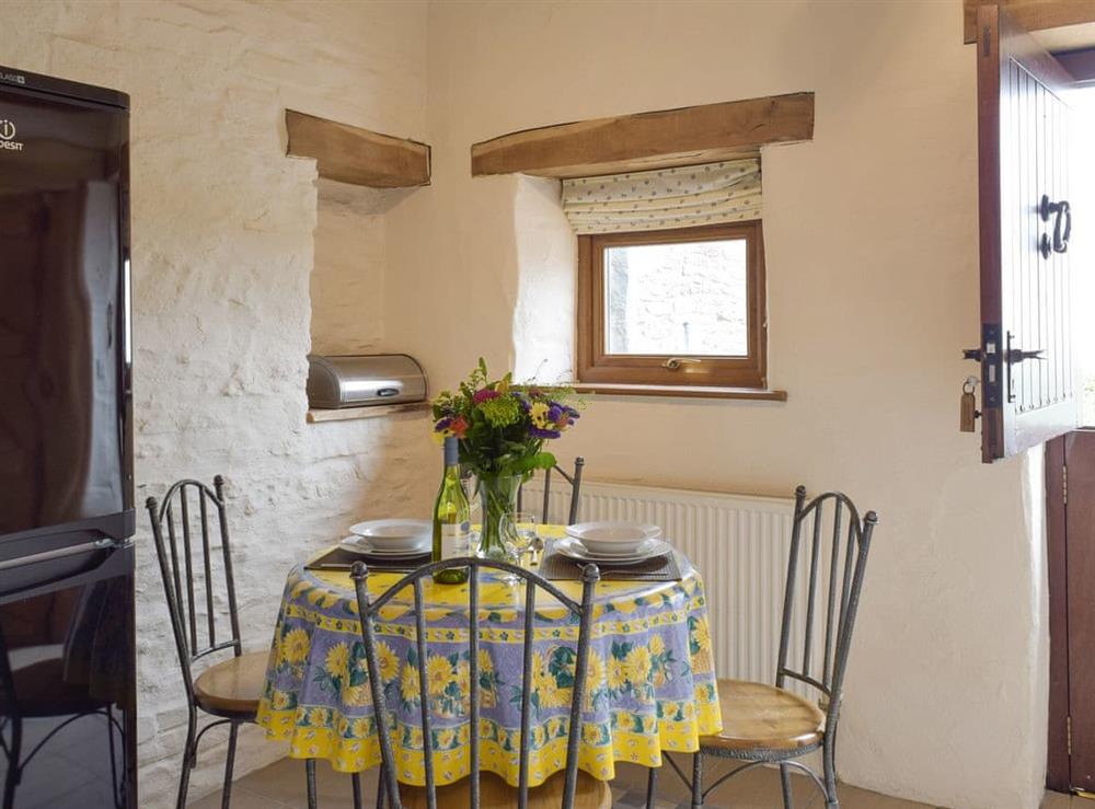 Dining area within kitchen at Hayloft Cottage, 