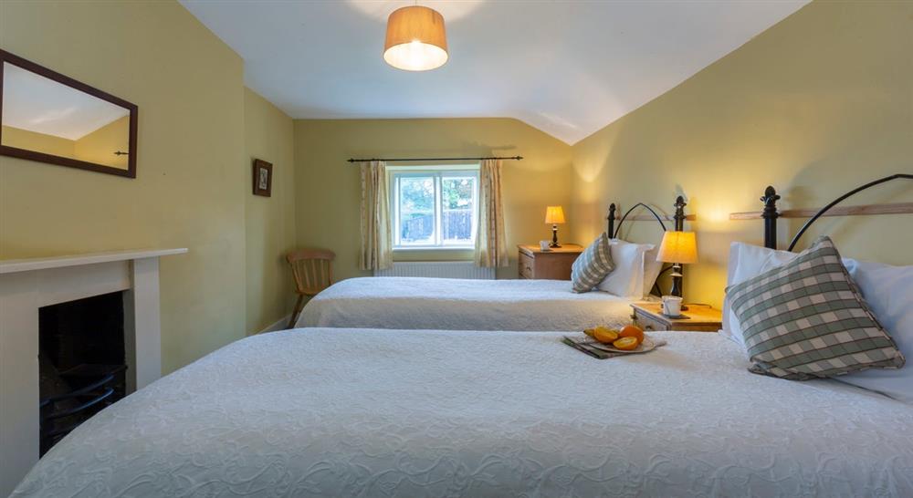 The twin bedroom at Croft Garden Cottage in Leominster, Herefordshire