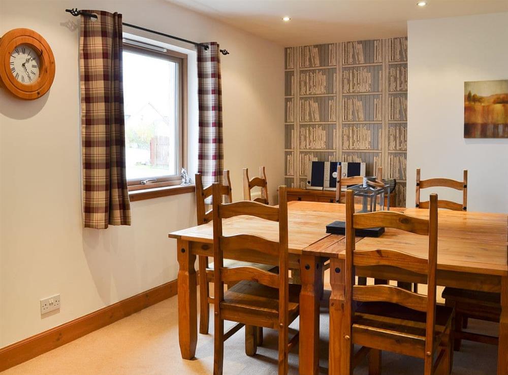 Charming dining area at Croftside House in Aviemore, Inverness-Shire