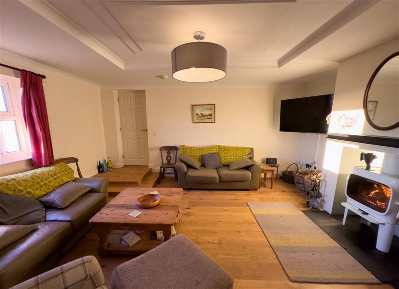 Relax in the living area at Crogal Farmhouse, New Quay