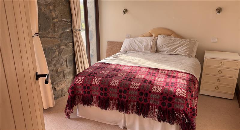 One of the bedrooms at Crogal Stable, New Quay