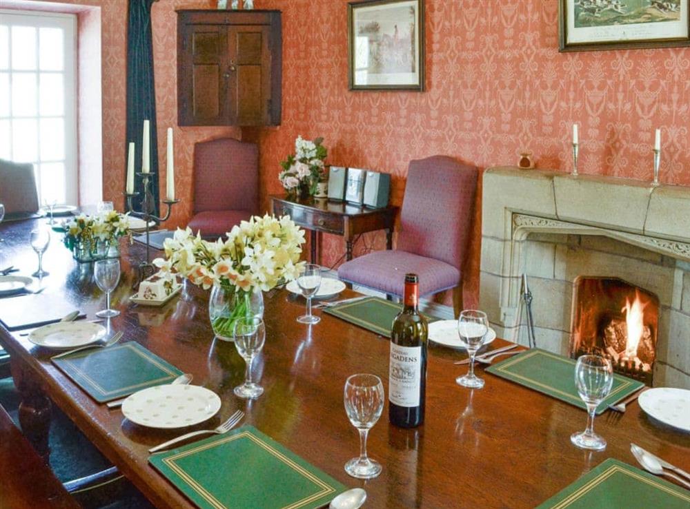 Elegant formal dining room with open fire at Crogen Coach House in Corwen, Denbighshire., Clwyd
