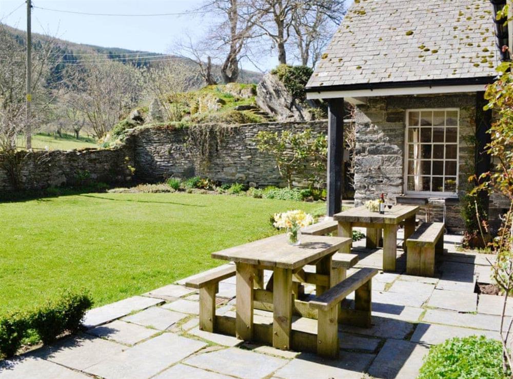 Paved patio with outdoor furniture at Crogen Coach House in Corwen, Denbighshire., Clwyd