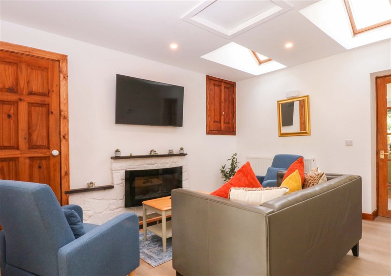 The living area at Cromlech Cottage at Cromlech Manor Farm, Tyn-y-Gongl near Benllech