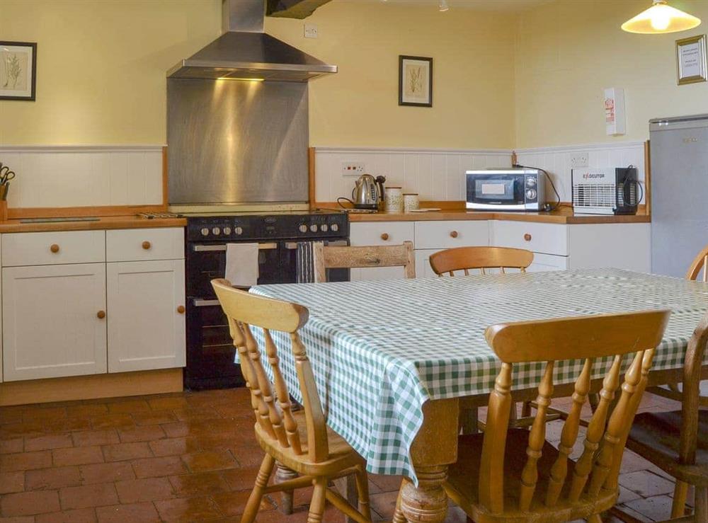 Well equipped farmhouse-style kitchen (photo 2) at Cronkhill Farmhouse in Attingham Park Estate, Nr Shrewsbury., Shropshire