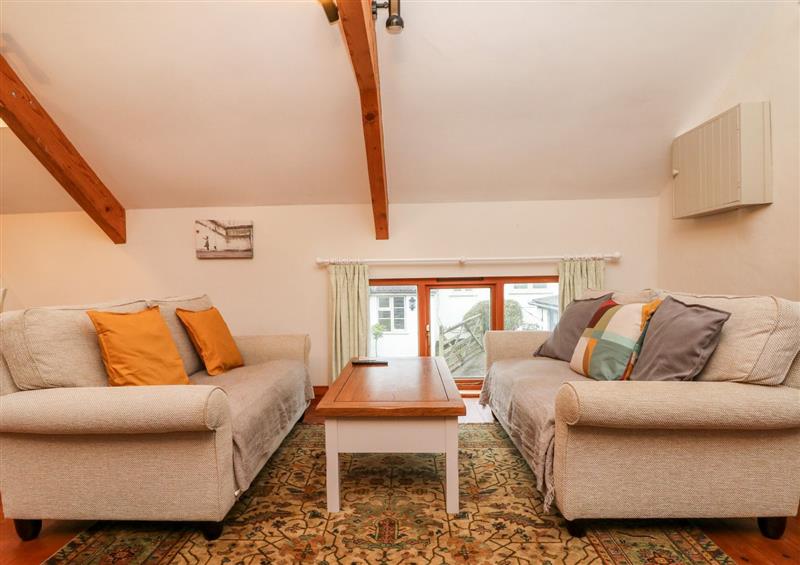 Relax in the living area at Crooke Barn, Withleigh near Tiverton
