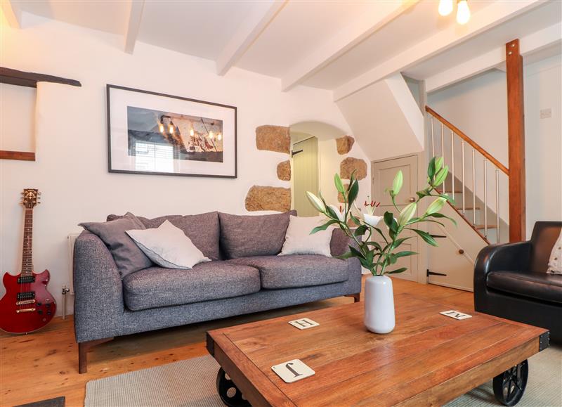 Relax in the living area at Crooked Cottage, Porthleven