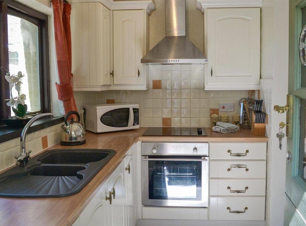 Well equipped kitchen area (photo 2) at Cross Cottage in St Breward, Cornwall