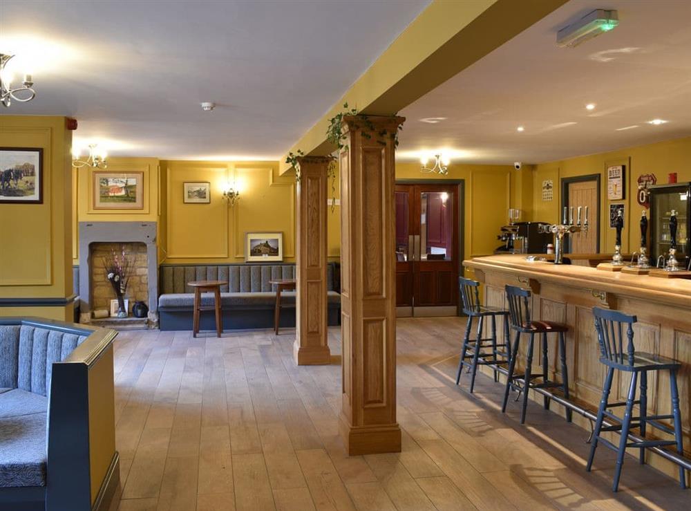 Interior of the on-site pub at Five Dorchester Drive, 