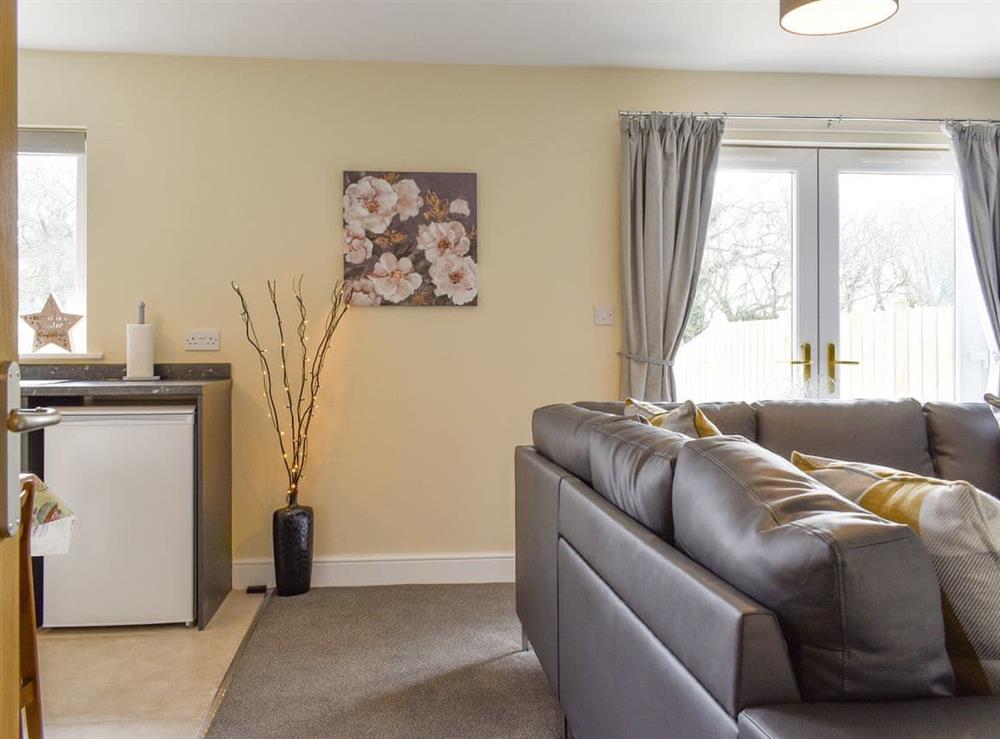 Open plan living space at Two Dorchester Drive, 