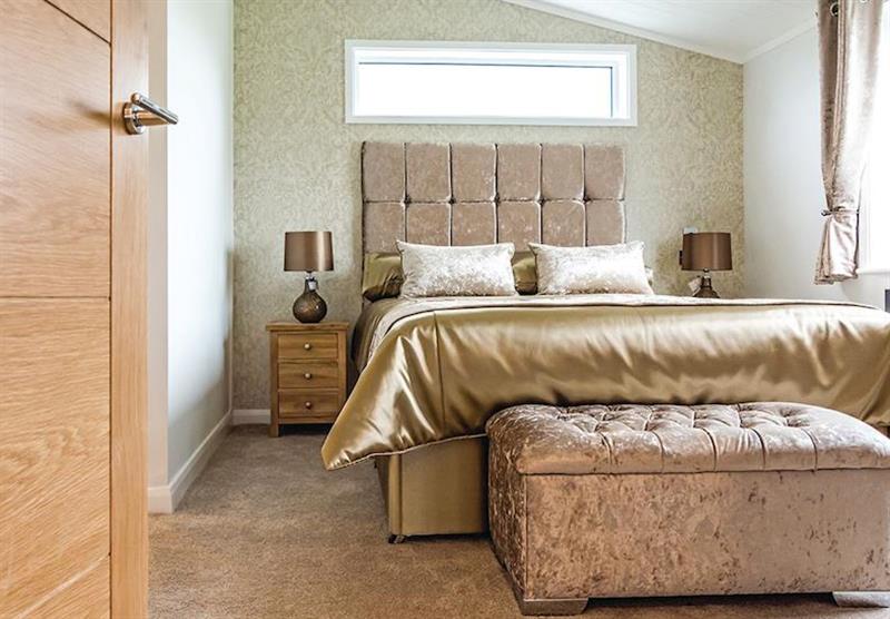 Bedroom in the Platinum Lodge 20 at Cross Park Holiday Village in Broadmoor, Nr Saundersfoot