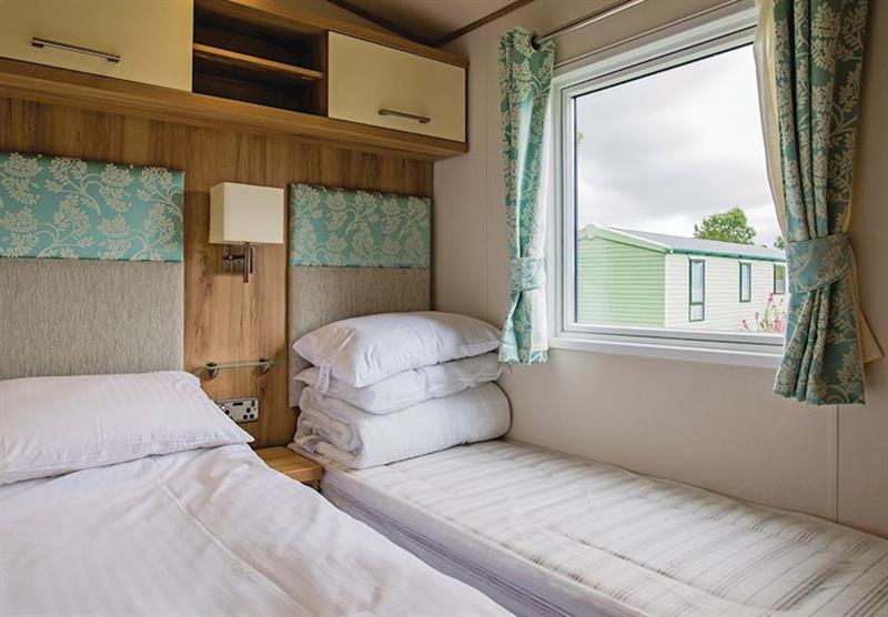 Twin bedroom in the Select Plus 3 at Cross Park Holiday Village in Broadmoor, Nr Saundersfoot