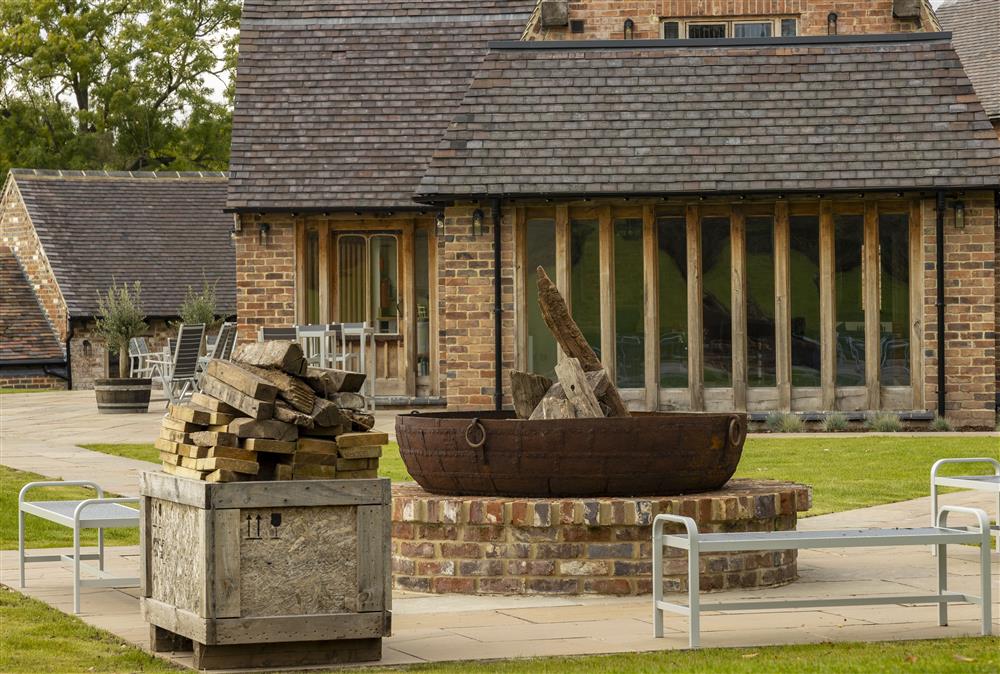 One of the two monumental iron fire pits, perfect for this dramatic property