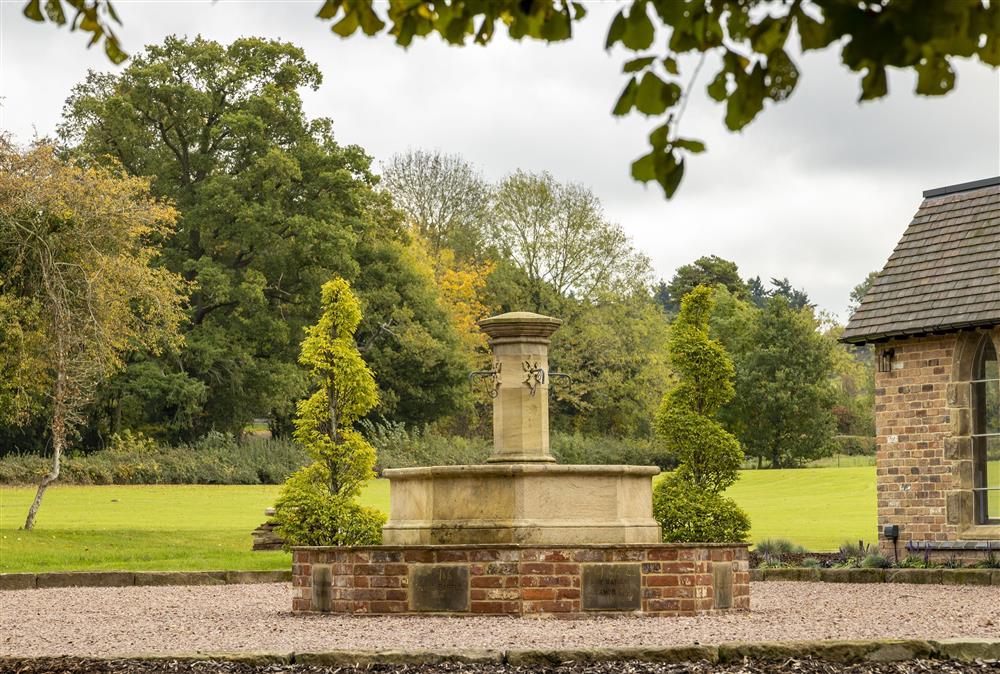 The circular driveway houses a beautiful French square fountain at Crossbrook Farm, Finstall nr Bromsgrove