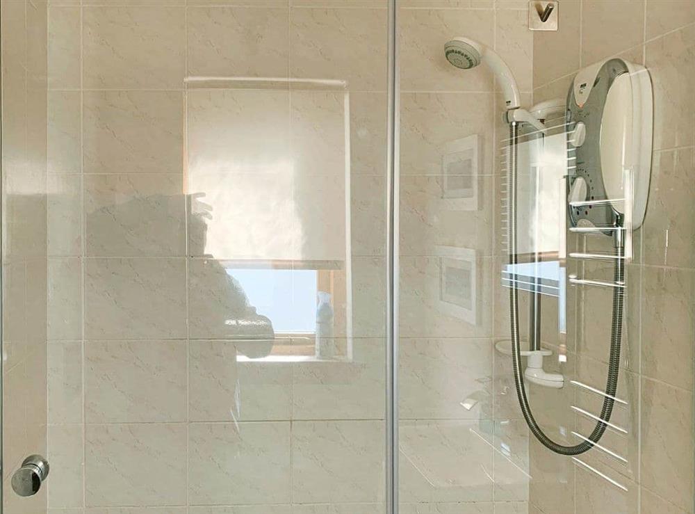 Shower room with shower cubicle and heated towel rail at Crossburn Hideaway in Arden, near Helensburgh, Argyll and Bute, Dumbartonshire