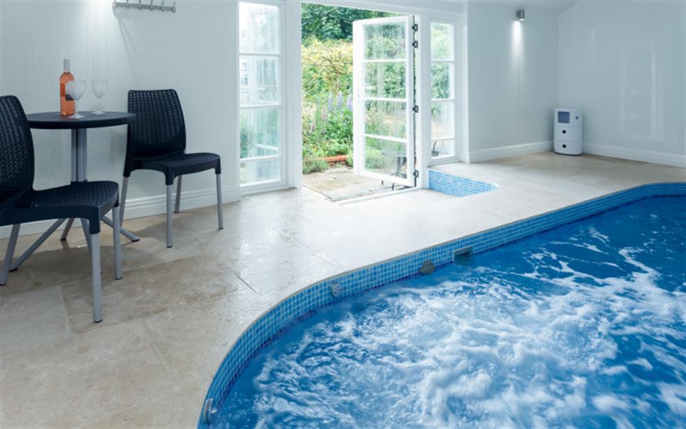Enjoy the swimming pool at Crossroads Cottage in Fordingbridge