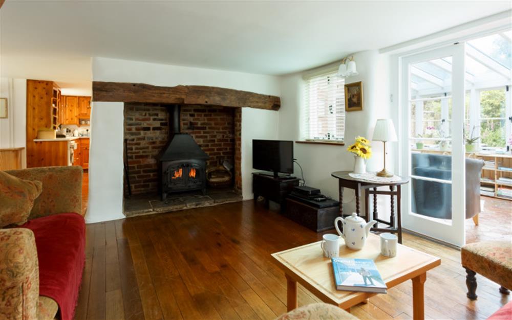 Relax in the living area at Crossroads Cottage in Fordingbridge