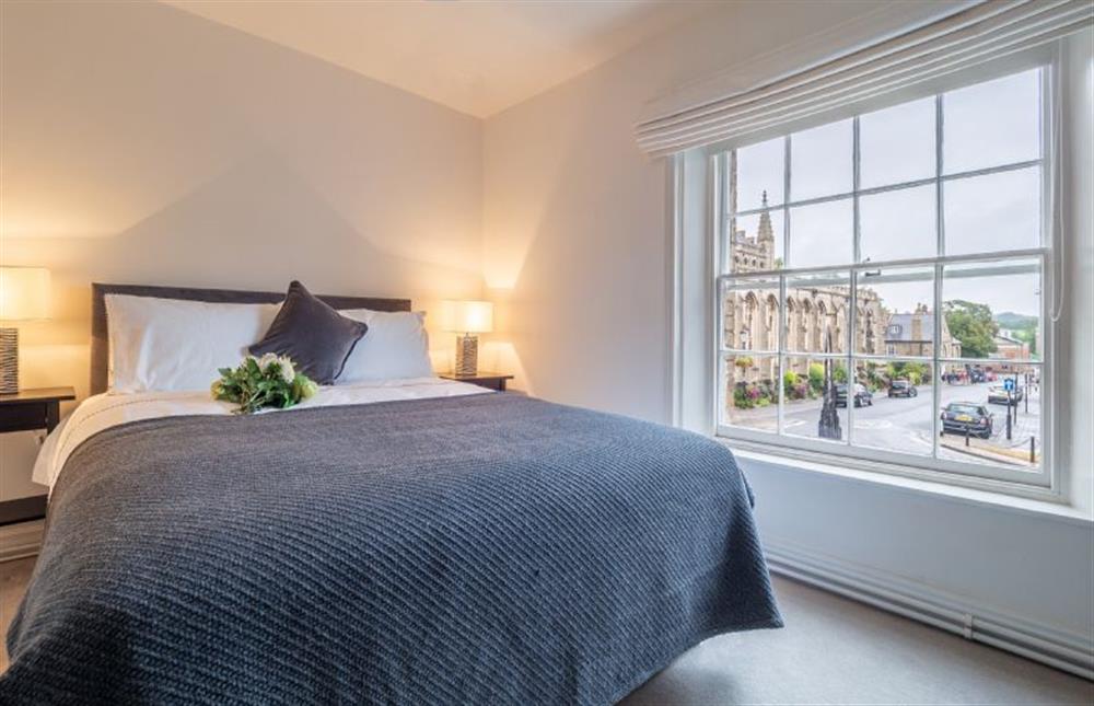 Master bedroom with king-size bed at Crown Street, Bury St Edmunds