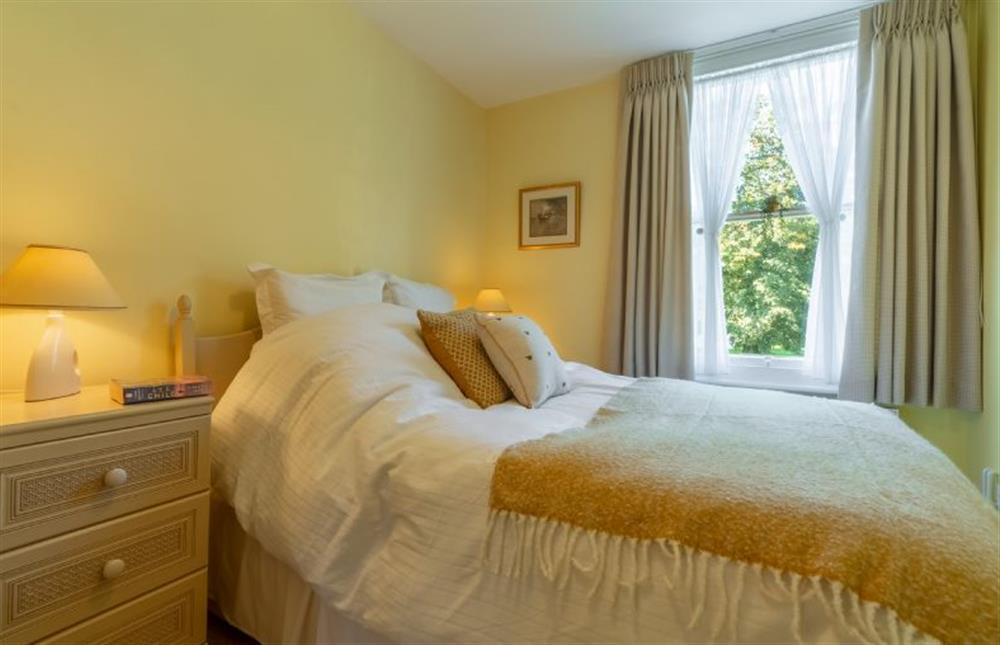First floor:  Bedroom 2 with large window overlooking the Buttlands at Crown Villa, Wells-next-the-Sea