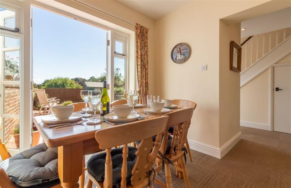 Ground floor:  Dining room with table and seating for six at Crown Villa, Wells-next-the-Sea