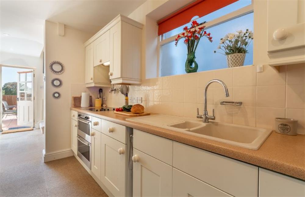 Ground floor:  Galley kitchen with plenty of cupboard space at Crown Villa, Wells-next-the-Sea