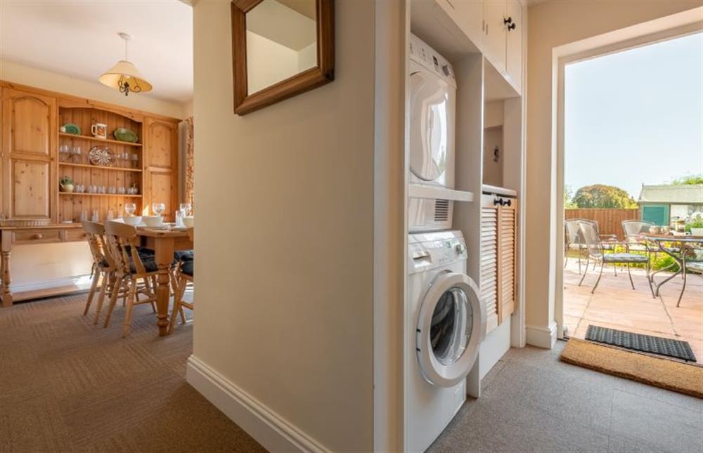 Ground floor:  Utility area with washing machine, tumble dryer and door to rear garden at Crown Villa, Wells-next-the-Sea