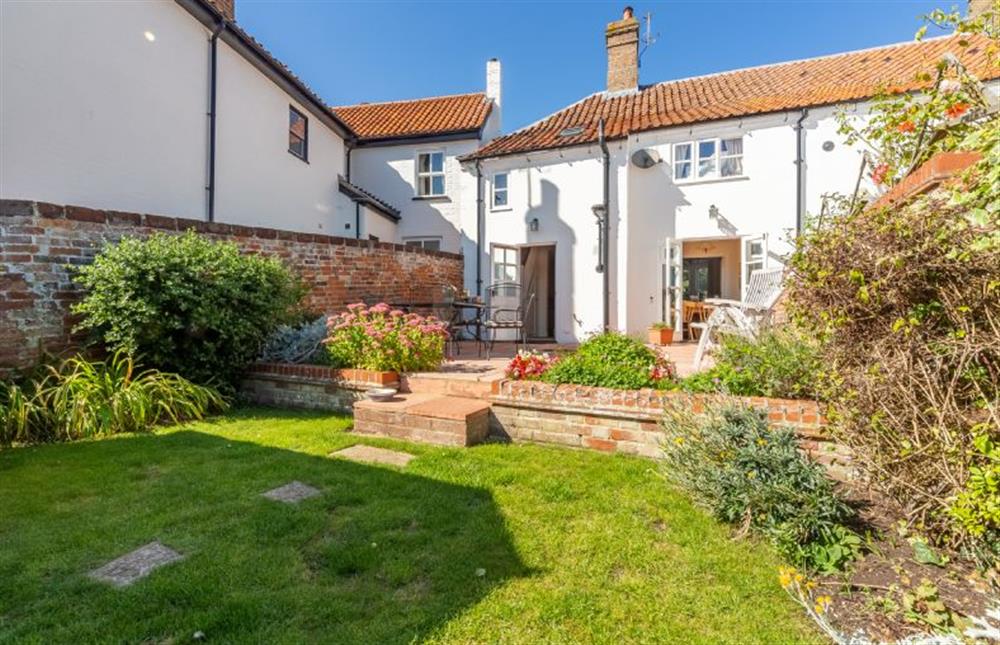 Rear Garden:  With steps down to lawned area at Crown Villa, Wells-next-the-Sea