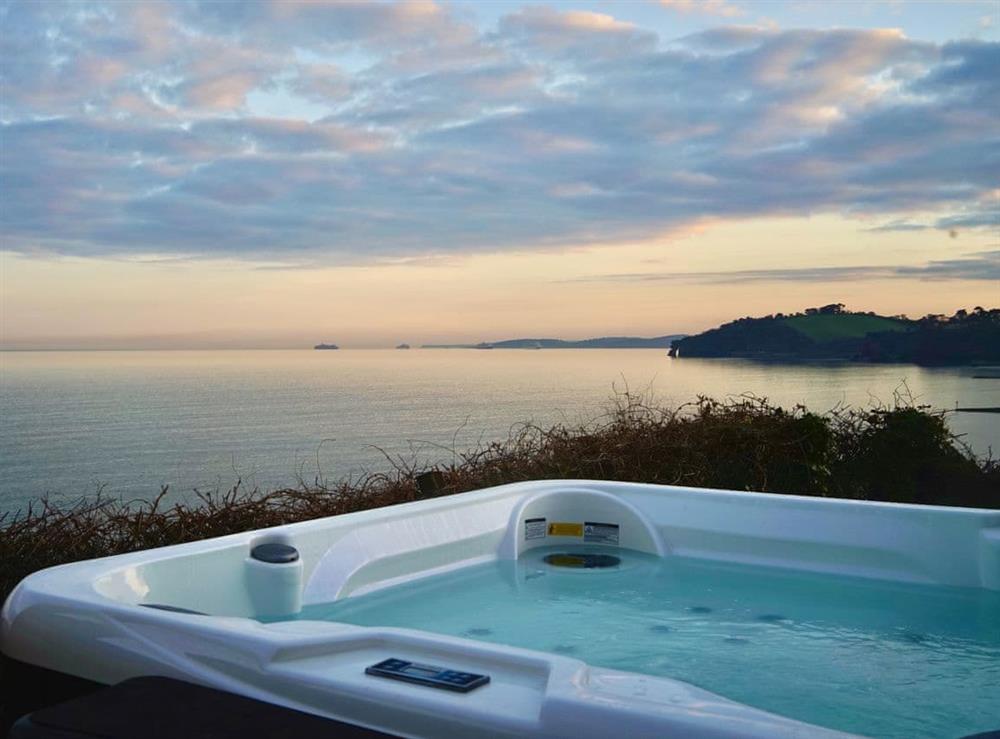 Relax and unwind whilst taking in the expansive sea views at Crows Nest in Dawlish, Devon