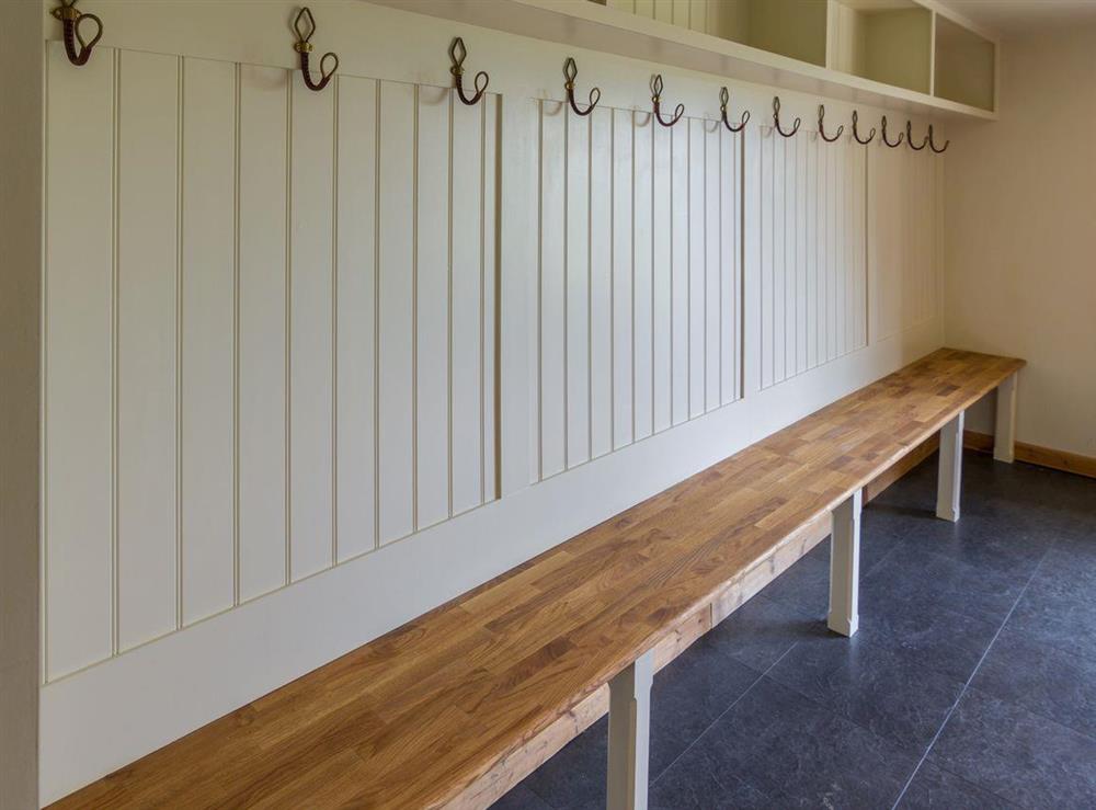 Open cloakroom in entrance hall at The Long Barn, 