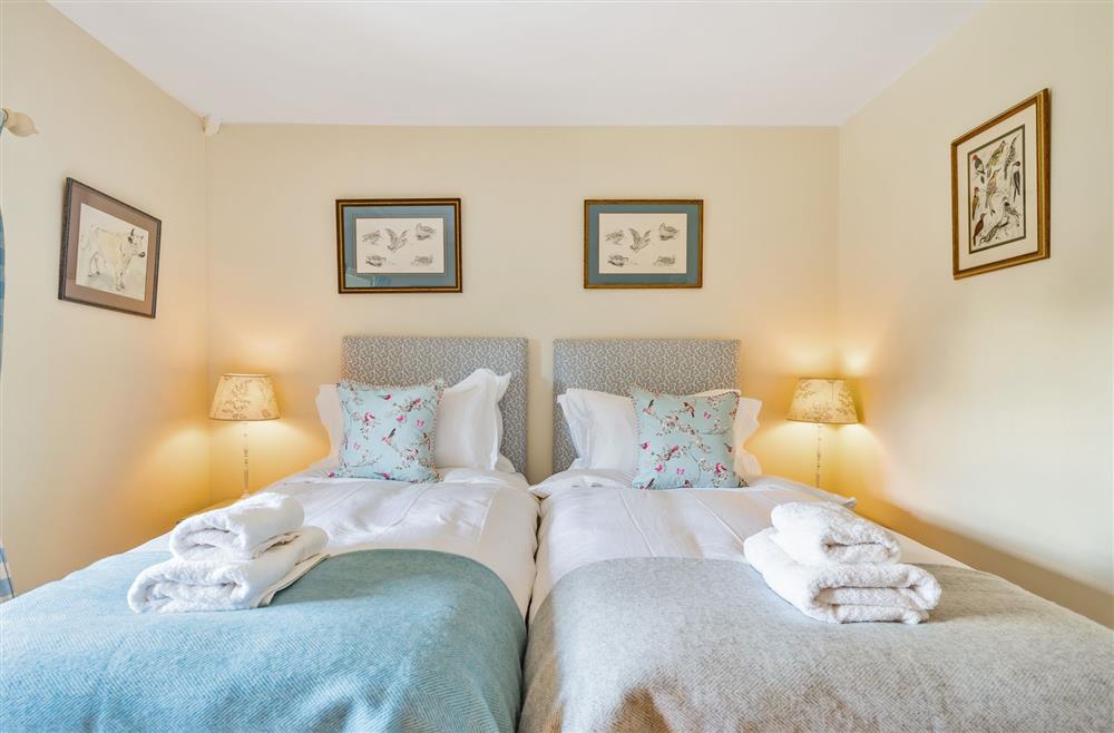 Attractive styling in the twin bedroom at Crumpet Cottage, Dorchester