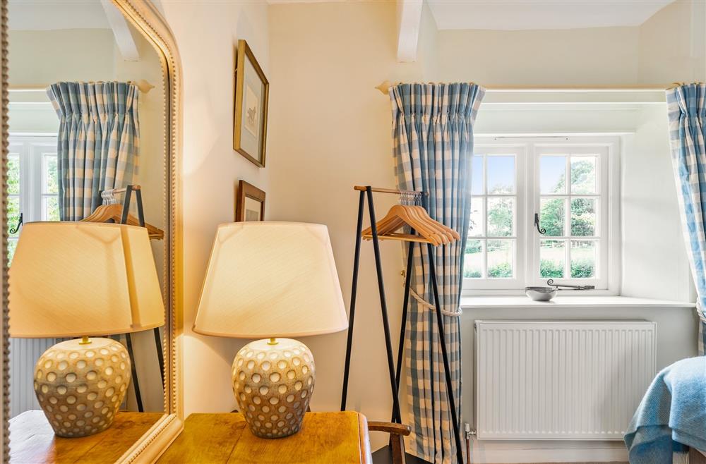 The twin bedroom with view of the front garden at Crumpet Cottage, Dorchester