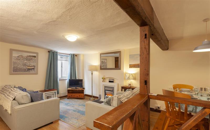 Relax in the living area at Cuain Cottage, Watchet