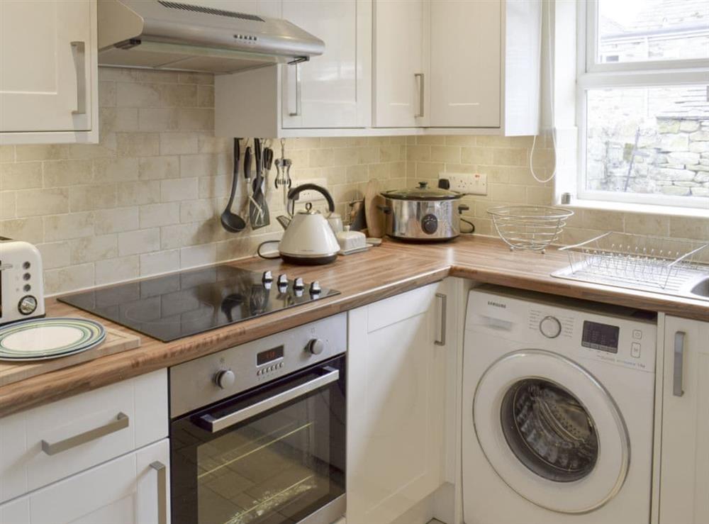 Well-equipped fitted kitchen at Cuckoo Hill View in Reeth, near Richmond, North Yorkshire