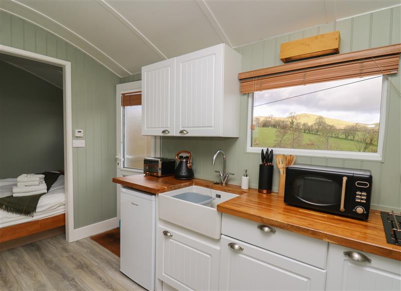 This is the kitchen (photo 2) at Cuckoo Hut, Maengwyneddd near Llanrhaeadr-Ym-Mochnant