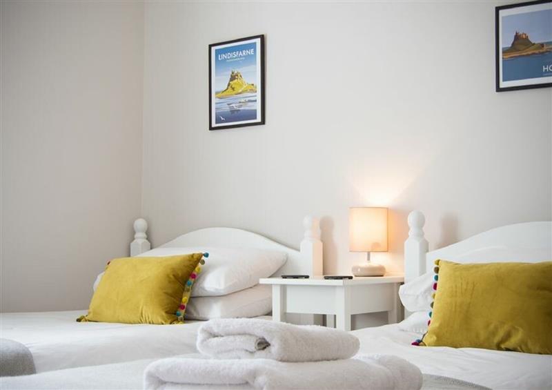 One of the bedrooms at Cuddy Cottage, Seahouses