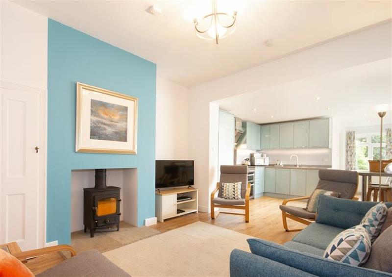 Relax in the living area at Cuddy Cottage, Seahouses