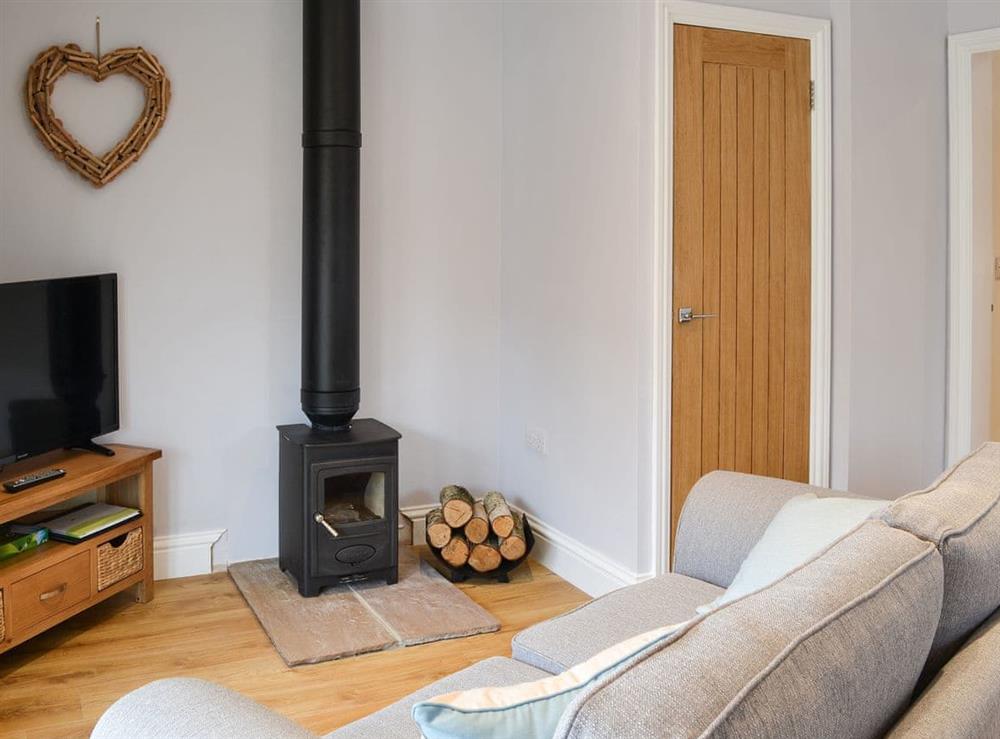 Cosy living space with wood burner at Cuddys Rest in Belford, near Bamburgh, Northumberland