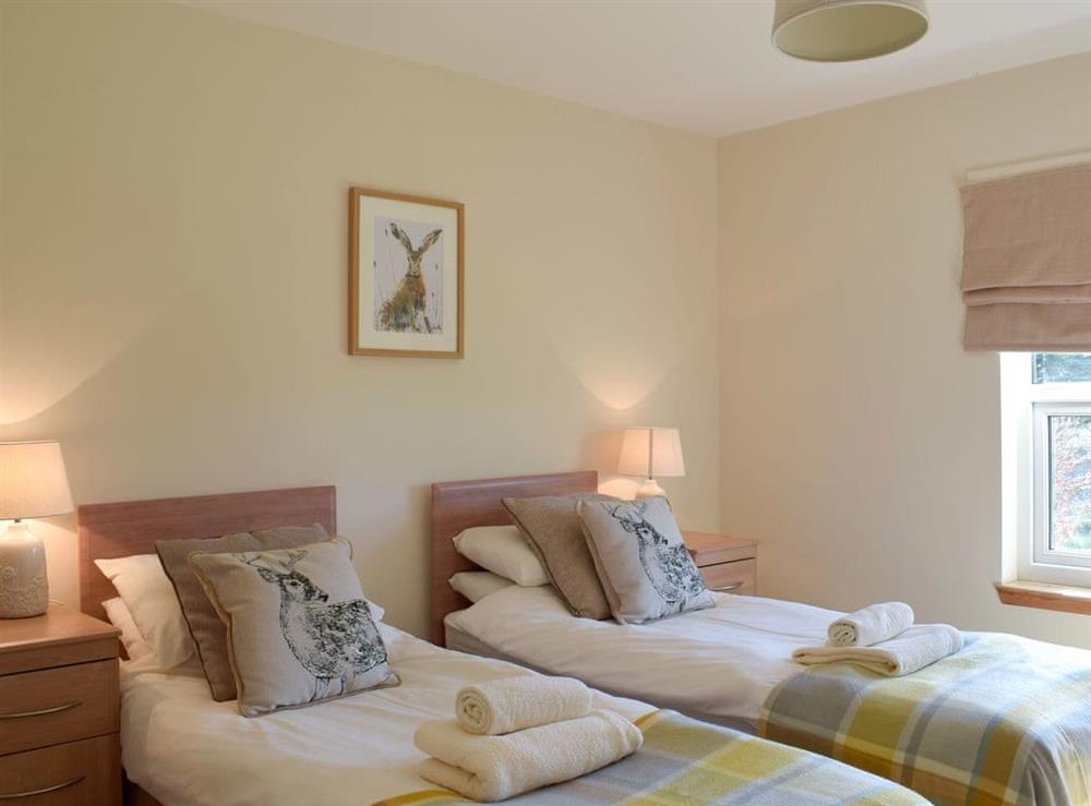 Comfy twin bedroom at Rowan Cottage, 