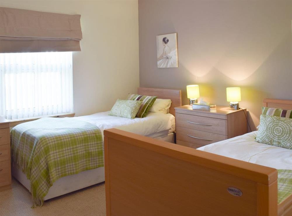 Comfy twin bedroom at Willow Cottage, 