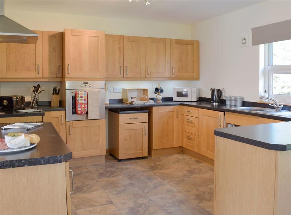 Large, well equipped kitchen at Pine Cottage, 