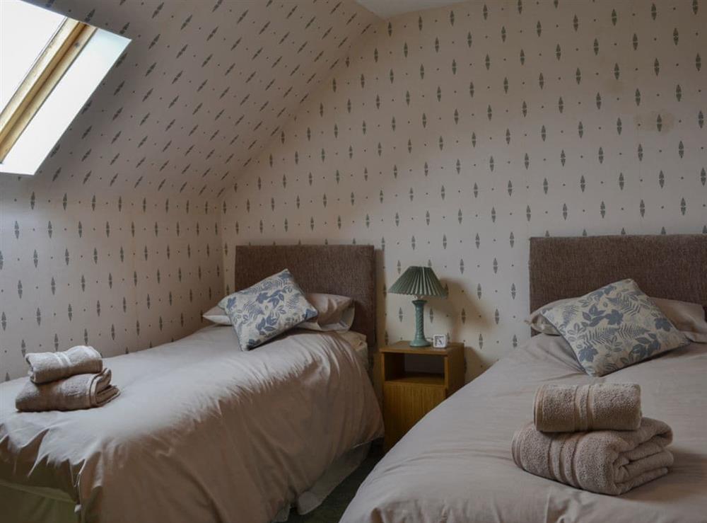 Cosy twin bedded room with sloping ceilings at Culquhasen in Newton Stewart, near Stranraer, Dumfries and Galloway, Wigtownshire
