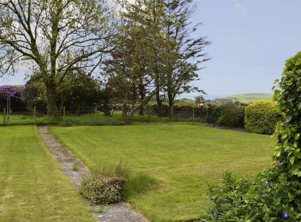 Garden mainly laid to lawn with fine views over the countryside at Culquhasen in Newton Stewart, near Stranraer, Dumfries and Galloway, Wigtownshire